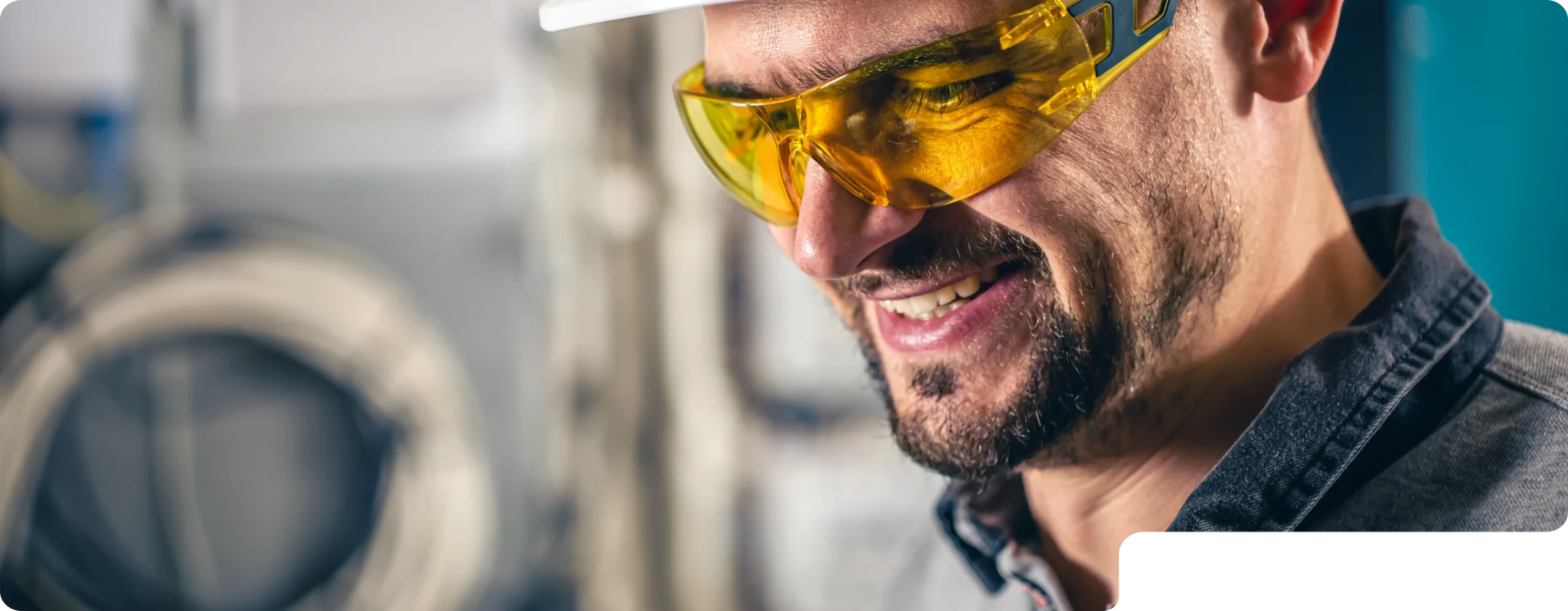 close-up of a man wearing yellow sunglasses